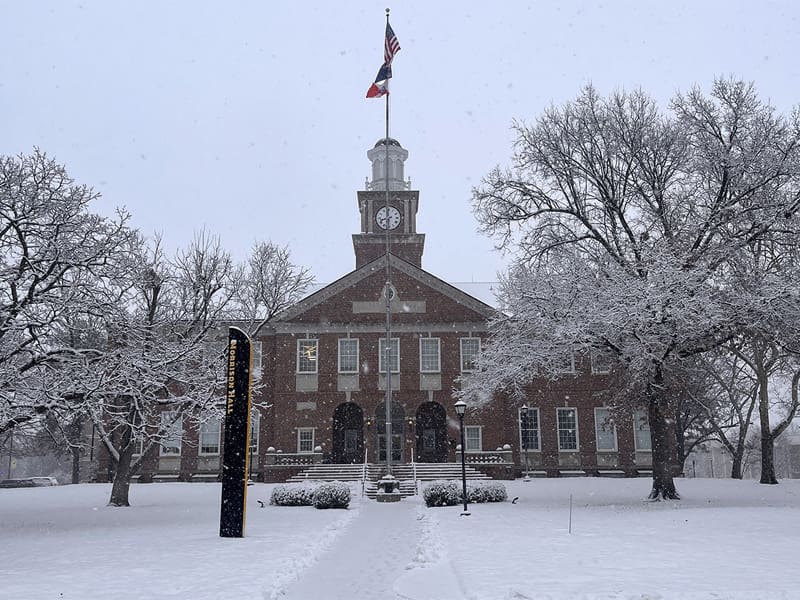 Morrison Hall on campus in the snow
