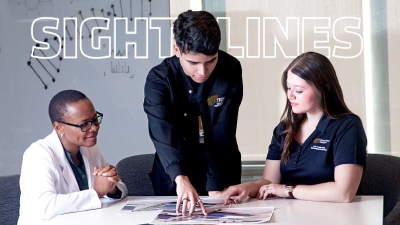 Three students are studying maps on a table. The words "Sight Lines" appear behind them.
