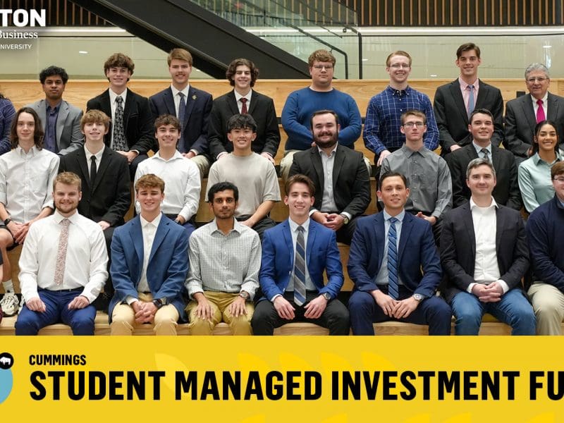 Cummings Student Managed Investment Fund Founding Members pose in the atrium of Woolsey Hall, home of the Barton School of Business.