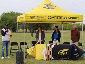 WSU Cricket Club president Sai Karthik Garnepudi, Provost Shirley Lefever, Wichita Mayor Lily Wu and Dr. Edwin Sawan participate in the cricket field ground-breaking at Dr. Glen Dey Park.
