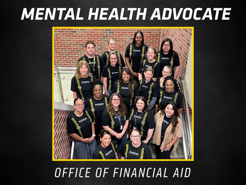 The Office of Financial Aid poses for a photo in their Suspenders4Hope T-shirts