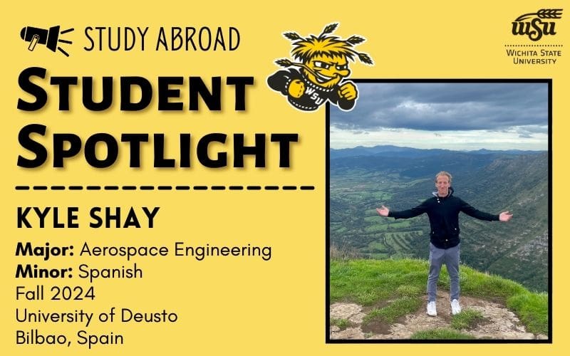 Photo of Kyle Shay on the mountains with his arms open wide. Information about Kyle Shay is included. His major is aerospace engineering and his minor is in Spanish. He studied abroad fall 2024 at the University of Deusto in Bilbao, Spain.