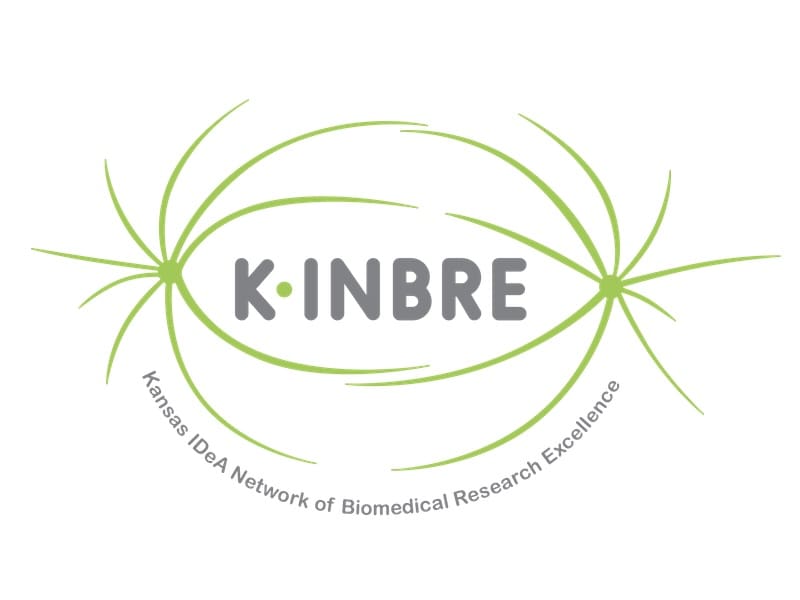 Logo for K-INBRE which includes depictions of abstract cell division surrounding the word "K-INBRE." Below is the design is "Kansas IDeA Network of Biomedical Research Excellence."