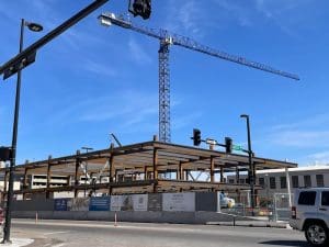 The site of the Wichita Biomedical Campus construction, showing steel being built and the tower crane
