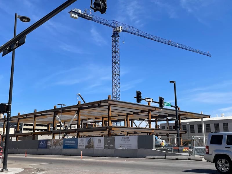 The site of the Wichita Biomedical Campus construction, showing steel being built and the tower crane