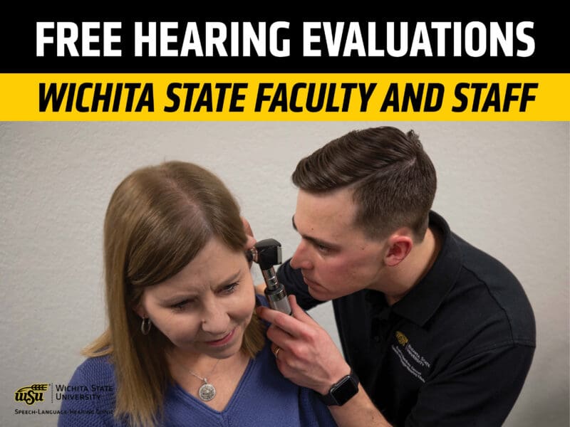 Audiologist giving a patient a hearing exam. Free Hearing Evaluations Wichita State Faculty and Staff