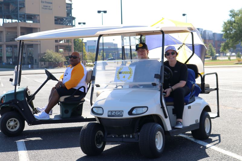 People who have volunteered to be golf cart drivers.