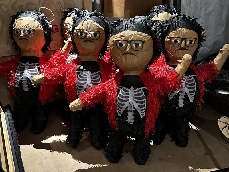 Piñatas of the artist Justin Favela are gathered in a group
