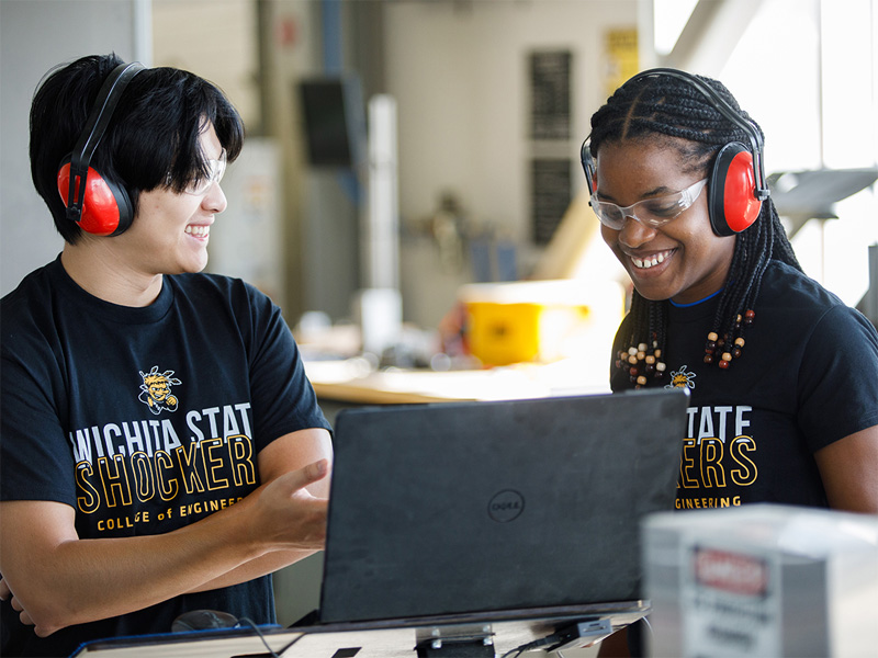 Wichita State engineering students collaborate on a prototype at the Project Innovation Hub.