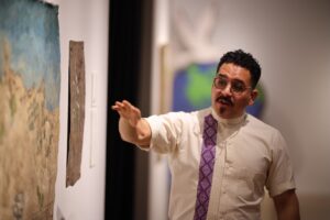 Dr. Emmanuel Ortega lectures to a class.