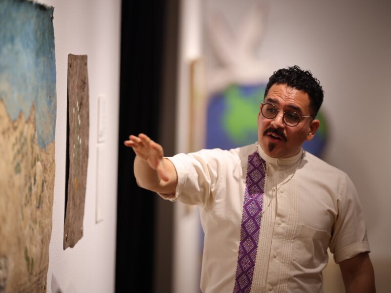 Dr. Emmanuel Ortega lectures to a class.