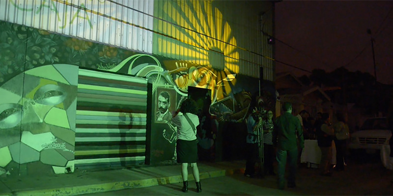 Attendees visit an art installation in Wichita