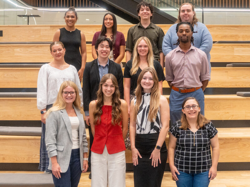 Students in the 2025-26 WGLP Cohort posed on the social stairs in Woolsey Hall