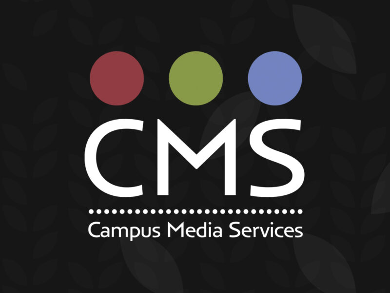 he image has a black background with a subtle pattern of dark gray leaves. At the top, there are three solid-colored circles arranged horizontally: a red circle on the left, a green circle in the center, and a blue circle on the right. Below the circles, large white text reads "CMS" in bold, modern font. Underneath "CMS," there is a horizontal row of small white dots forming a line. Beneath the dotted line, smaller white text reads "Campus Media Services".