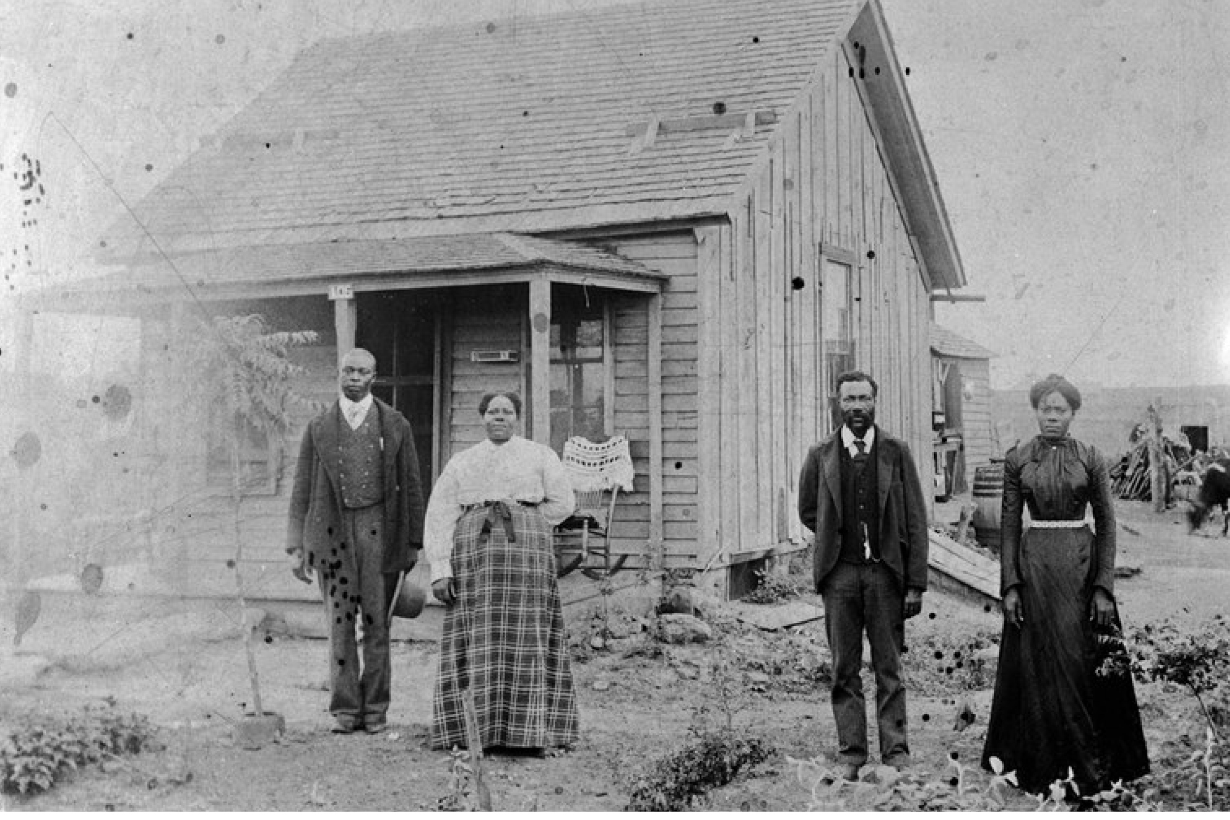Historic photo of African American settlers in front of a house in Nicodemus, Kansas. Source: High Country News Historic photo of African American settlers in front of a house in Nicodemus, Kansas. Source: High Country News